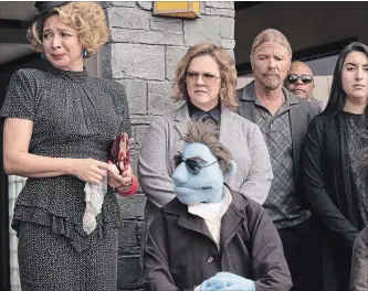  ?? HOPPER STONE THE ASSOCIATED PRESS ?? Maya Rudolph, left, and Melissa McCarthy do their best to bring “The Happytime Murders" to life.