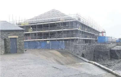  ??  ?? A £2.5m project is giving the Grade II listed Jennings Building on Porthcawl seafront a new lease of life