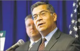  ?? Rich Pedroncell­i Associated Press ?? STATE Atty. Gen. Xavier Becerra details the settlement with Equifax, which will pay as much as $700 million — $4.75 per person exposed in the 2017 data breach.