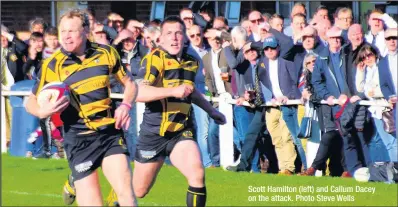  ??  ?? Scott Hamilton (left) and Callum Dacey on the attack. Photo Steve Wells