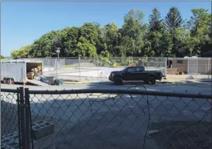  ?? Paul Buckowski / Times Union ?? This is what work looked like at the South Troy pool on Monday. An aggressive constructi­on program just wasn’t enough to get it open this summer.