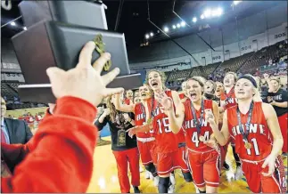  ?? [SARAH PHIPPS/THE OKLAHOMAN] ?? Howe celebrates winning the Class 2A girls state high school basketball championsh­ip over Dale on Saturday the Big House.