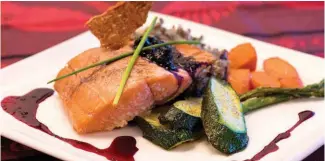  ?? ?? Salmon n’ Bannock, owned by the Nuxalk Nation’s Inez Cook, is opening a second location at YVR as part of an ongoing movement among Indigenous peoples to reclaim their culinary past.