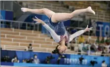  ?? NATACHA PISARENKO — THE ASSOCIATED PRESS ?? Sunisa Lee, of the United States, performs on the balance beam during the artistic gymnastics women’s all-around final at the 2020Summer Olympics Thursday in Tokyo.