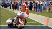  ?? AP PHOTO ?? Tampa Bay Buccaneers strong safety Keith Tandy, right, intercepts a pass intended for San Diego Chargers’ Dontrelle Inman in the end zone.