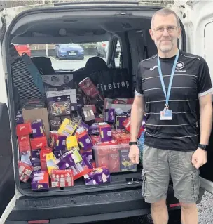  ??  ?? ●●Hopwood Hall’s Uniformed Public Services teaching assistant Simon Rogers with the donated eggs