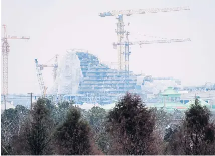  ?? AFP ?? This photo taken in Shanghai on February 2, 2015, shows the building site of the Shanghai Disney Resort in Pudong area.
