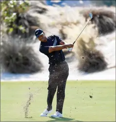  ?? DAVID CANNON / GETTY IMAGES ?? Tiger Woods plays the third hole during Wednesday’s first round of the 2019 Hero World Challenge at Albany in Nassau, Bahamas. He chopped his way to a bogey-double bogey finish for a 72.