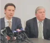  ?? SUN-TIMES DAVID ROEDER/ ?? Attorneys Patrick Salvi Jr. and Todd Smith speak at a news conference Thursday about the state’s proposed settlement with Sterigenic­s.