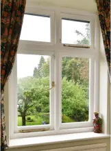  ?? ?? Above: New timber casement sashes manufactur­ed and installed into existing frames by The Sash Window Workshop