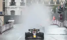  ?? AFP ?? Red Bull Racing’s Max Verstappen competes during the Monaco Grand Prix at the Monaco street circuit yesterday,