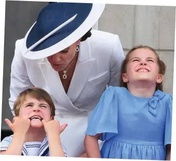  ?? ?? Plane crazy: He pulls a funny face watching the Jubilee flypast with Charlotte