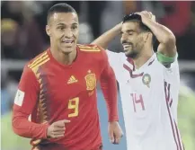  ??  ?? 0 Joy and pain as Spain’s Rodrigo celebrates the late goal.