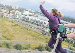  ??  ?? Not for the faint-hearted Donna steps off the 150ft high crane platform