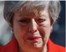  ?? AFP ?? Conteniend­o las lágrimas, la primera ministra británica anunció su renuncia este viernes.