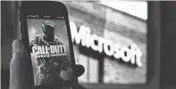  ?? PETER MORGAN/AP FILE ?? Microsoft’s and Activision Blizzard’s CEOs pledged to keep Activision’s blockbuste­r game Call of Duty available to people who play it on consoles that compete with Microsoft’s Xbox.