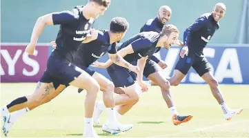  ?? — AFP photo ?? England’s players during training in Repino.