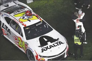  ?? PHELAN M. EBENHACK/AP ?? WILLIAM BYRON (24) celebrates his win with team owner Rick Hendrick in the Daytona 500 auto race at Daytona Internatio­nal Speedway on Feb. 19 in Daytona Beach, Fla.