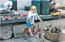  ?? COURTESY PHOTO ?? Irena Ossola fell in love with bicycling early in life. According to her website, this is a young Ossola in Italy, where she first started to ride. In Santa Fe, Ossola once said she recalls the day when her mother first let her ride her bicycle to...