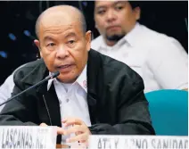  ?? AP Photo ?? Arturo Lascanas testifies before a senate inquiry into extrajudic­ial killings linked to Rodrigo Duterte in Manila yesterday.