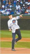  ?? AP-Yonhap ?? PGA golfer Jordan Spieth throws out a ceremonial first pitch before a baseball game between the Chicago Cubs and the New York Mets in Chicago, Tuesday.