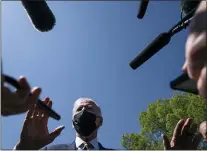  ?? EVAN VUCCI — THE ASSOCIATED PRESS ?? President Joe Biden talks with reporters on the Ellipse on the National Mall after spending the weekend at Camp David, Monday, April 5, 2021, in Washington.