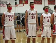  ?? COURTESY BRODY BOLYN ?? Jake Bolyn (25), Brody Bolyn (33) and Sam Cerimele (12) stand next to each other before the national anthem during a home game against Upper Merion this season.