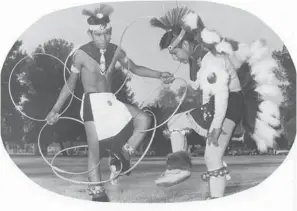  ??  ?? Emerson Boyd Thomas, a hoop dancer from Winslow, Ariz., and Randal Cleveland, an eagle dancer from Shiprock, N.M., at Phoenix Indian School. ARIZONA REPUBLIC
RALPH CAMPING/ARIZONA REPUBLIC