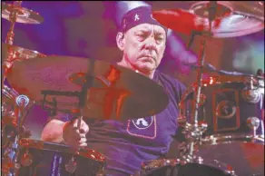  ?? The Associated Press file ?? Neil Peart of Rush performing during the final show of the “R40 Live” tour in Los Angeles in 2015. The renowned drummer and lyricist died Tuesday at his home in Santa Monica, Calif. He was 67.