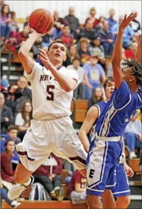  ?? KIRK NEIDERMYER - FOR DIGITAL FIRST MEDIA ?? Governor Mifflin’s Bubba Peters puts up the shot in mid air against Exeter at Governor Mifflin Intermedia­te School in Reading on Friday, January 27, 2017.