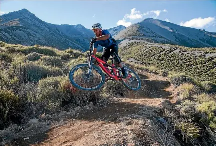  ?? PHOTO: LUKE ARMSTRONG ?? Darryl McCabe gets some air off one of the jumps built into the track.