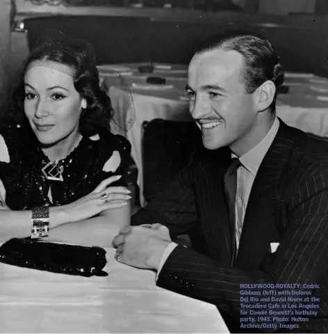  ??  ?? HOLLYWOOD ROYALTY: Cedric Gibbons (left) with Dolores Del Rio and David Niven at the Trocadero Cafe in Los Angeles for Connie Bennett’s birthday party, 1943. Photo: Hulton Archive/Getty Images