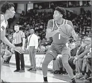  ?? Spurs and Feathers/ALLEN SHARPE ?? Arkansas guard Isaiah Joe (1) surveys the defense during Saturday’s game in Columbia, S.C. Joe tied former Razorbacks guard Pat Bradley for the second-most three-pointers in a season by an Arkansas freshman with 82.