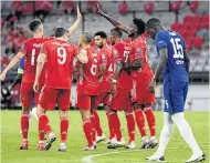  ??  ?? UNSTOPPABL­E Bayern players celebrate Perisic’s goal