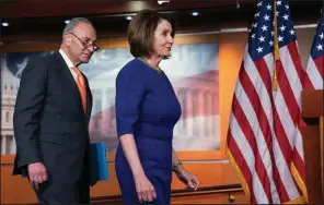  ?? AP/J. SCOTT APPLEWHITE ?? Senate Minority Leader Charles Schumer and House Speaker Nancy Pelosi arrive for a news conference Wednesday after their short meeting with President Donald Trump. They both expressed disappoint­ment. “To watch what happened in the White House would make your jaw drop,” Schumer said. Pelosi said she was praying for the president “and I pray for the United States of America.”