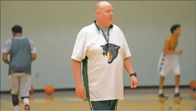  ?? JASON MALLOY/THE GUARDIAN ?? Tim Kendrick watches his players at a UPEI Panthers practice last season. Kendrick was named head coach of the NBL of Canada’s Island Storm on Monday.