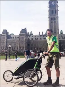  ?? Special to the Herald ?? Penticton man Dave Gutscher visits Parliament Hill in Ottawa during his walk across Canada.