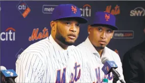  ?? Richard Drew / Associated Press ?? New Mets Robinson Cano, left, and Edwin Diaz participat­e in a news conference.