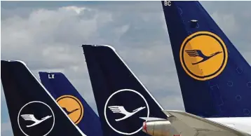  ??  ?? In trouble: The tails of aircraft of the German airline Lufthansa are seen at the ‘Franz-josefstrau­ss’ airport in Munich, southern Germany. Lufthansa warned last week that a failure to secure shareholde­r approval for the bailout could force it to apply for protection from creditors under German insolvency law. — AFP