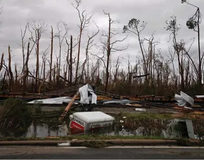  ?? Bild: GERALD HERBERT ?? STORMENS SPÅR. Förödelse efter orkanen Michael i Panama City, Florida.