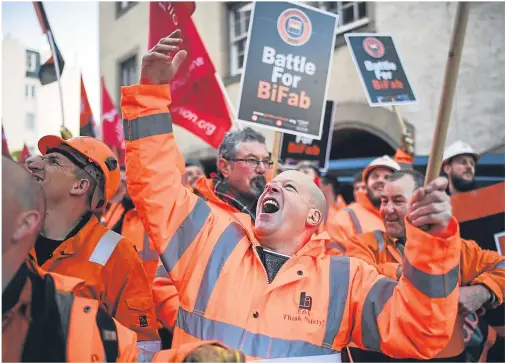  ??  ?? DETERMINED: Workers from engineerin­g firm BiFab held a demonstrat­ion in Edinburgh as the future of its three yards hung in the balance