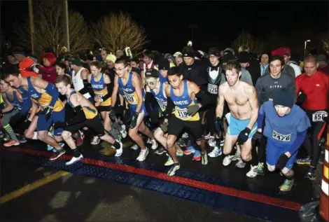  ?? FILE PHOTO ?? Runners jump off the line during a previous First Night 5k at Skidmore College in Saratoga Springs.