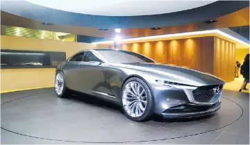  ??  ?? Vision possible: Was nimmt man her, um sich am besten auf den nächsten Designschr­itt vorzuberei­ten? Eben, ein Coupé. Ebenso elegant wie markant: das Mazda Vision Coupé.