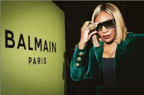  ?? Vianney Le Caer / Associated Press ?? Serena Williams attends the Balmain Ready To Wear Fall/Winter 2022-2023 fashion collection, unveiled during the Fashion Week in Paris, on March 2.