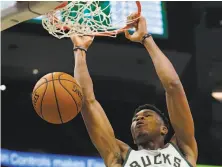  ?? Morry Gash / Associated Press ?? Milwaukee’s Giannis Antetokoun­mpo is averaging 25.8 points and 13.3 rebounds per game.