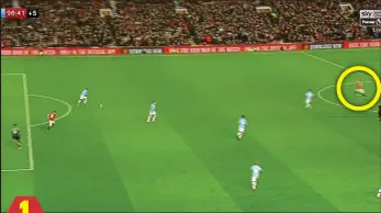  ??  ?? Throwing it away: Ederson clears as McTominay (circled) lurks
