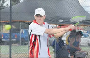  ??  ?? FOCUS: St Michaels’ Ian Nitschke plays a shot against Drung South’s Logan Casey in Saturday’s Central Wimmera Tennis Associatio­n pennant grand final. Casey won the singles encounter 8-5 but Nitschke celebrated at the end of the day as his side claimed the title by four sets.
Picture: DYLAN DE JONG