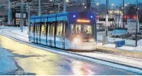  ?? DAVID BEBEE WATERLOO REGION RECORD ?? An Ion train travels down Charles Street after a morning and afternoon closure of the system due to a winter storm Sunday.