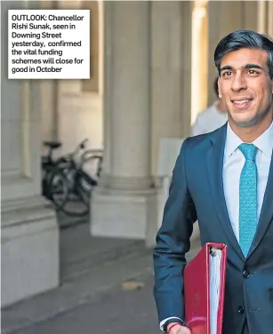  ??  ?? OUTLOOK: Chancellor Rishi Sunak, seen in Downing Street yesterday, confirmed the vital funding schemes will close for good in October