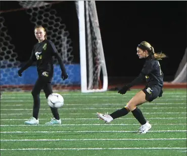  ??  ?? North Smithfield captain Ally Paux delivers a free kick during the first half of the No. 2 Northmen’s 2-1 overtime defeat to No. 6 Chariho in the Division II semifinals. The Chargers will face Moses Brown Saturday for the title.